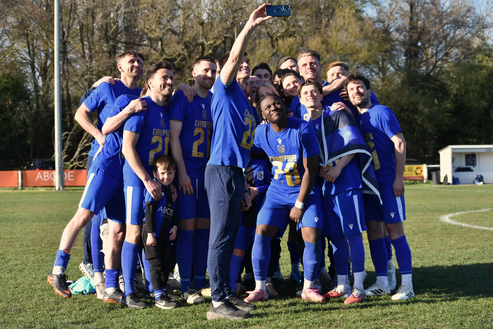 Mulbarton Wanderers' players celebrate at Mulberry Park after being presented with the Thurlow Nunn Premier Division title in April. The photograph is from the club's own album and was not taken at Tuesday's replay
