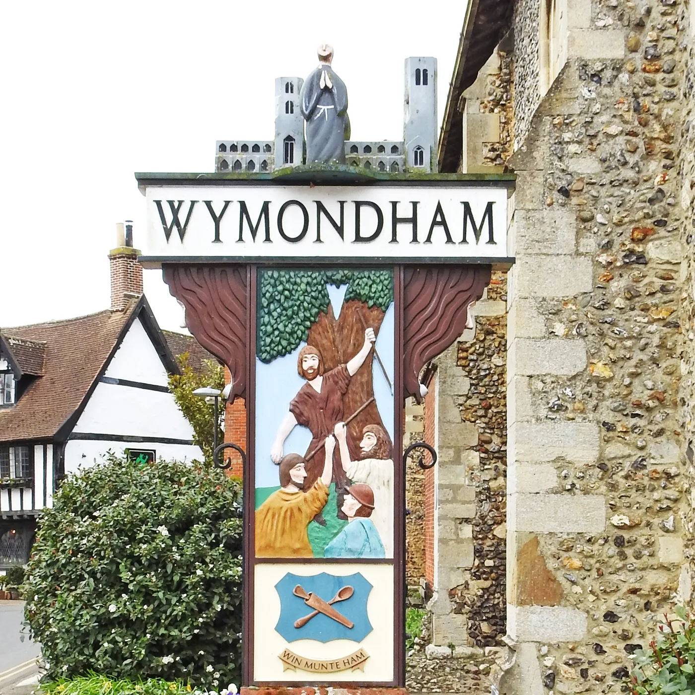 Wymondham's town sign. Under the withdrawn plan, Wymondham and neighbouring Wicklewood would have ended up in different councils