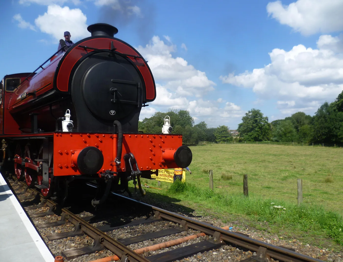 Wymondham Abbey station on the Mid-Norfolk Railway, where the Halloween Express starts. Photographed on a summer steam day; the Halloween trains use a Class 142 Pacer